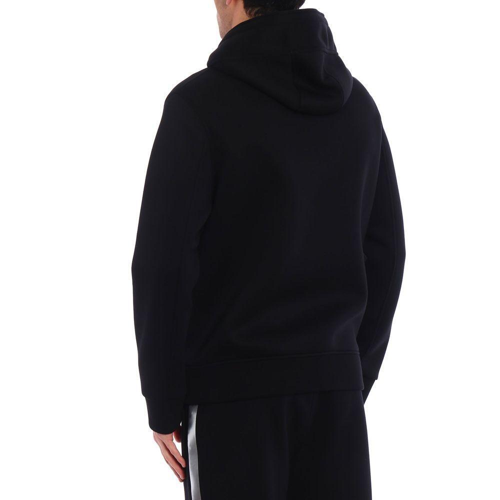 Front view with bag zipped and handles upright.