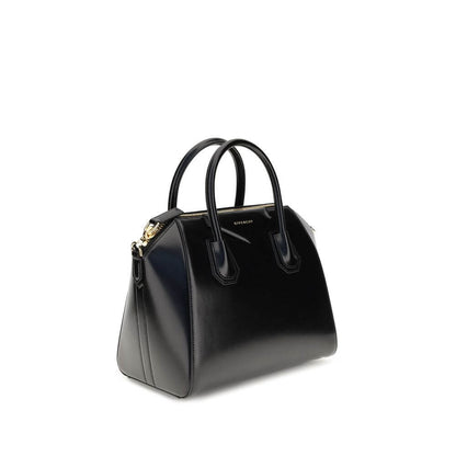 Givenchy Black Calf Leather Bos Taurus Handbag with gold-finished hardware and adjustable strap.