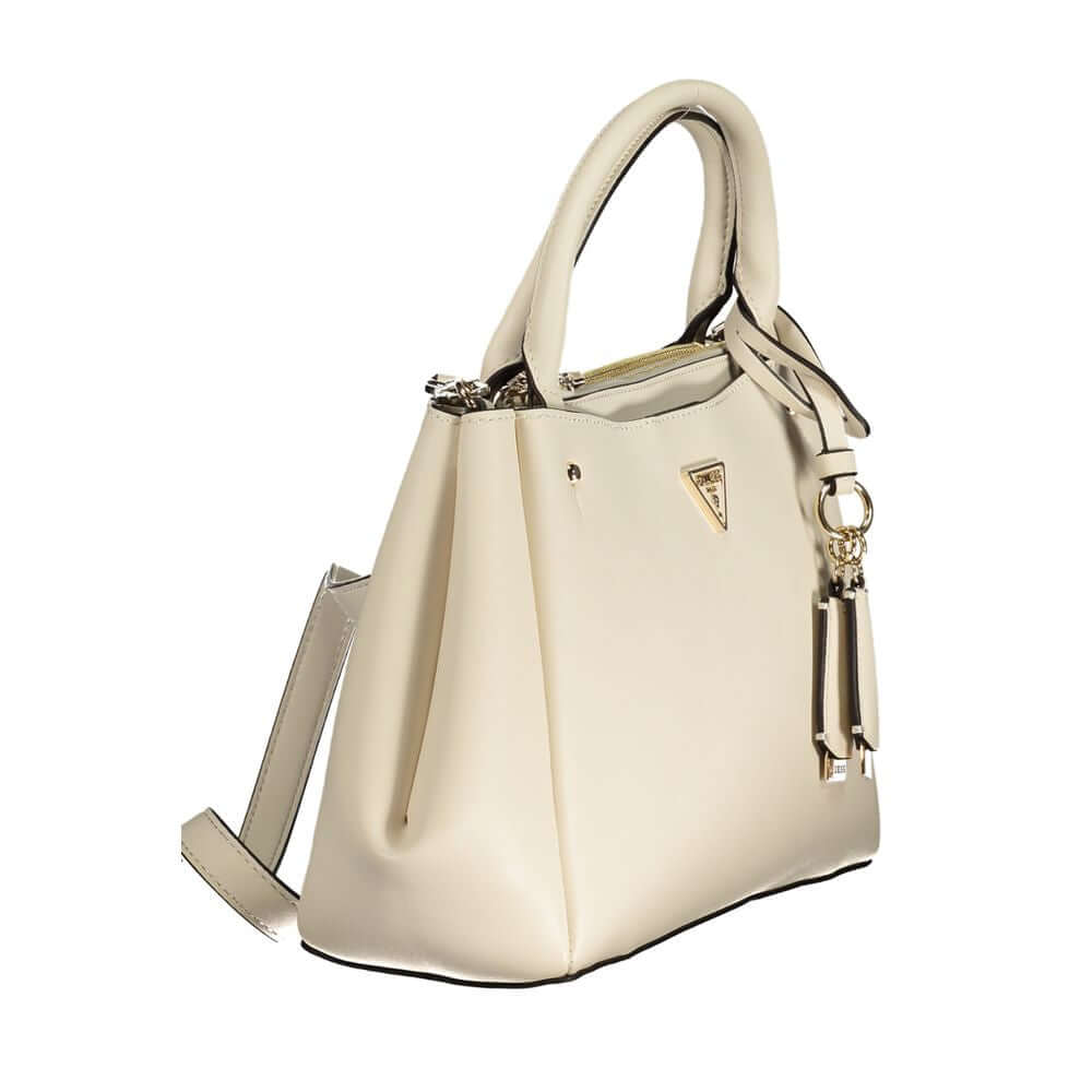 Side view of Guess Jeans White Polyethylene Women Handbag with adjustable strap and external pockets showcasing its chic design.