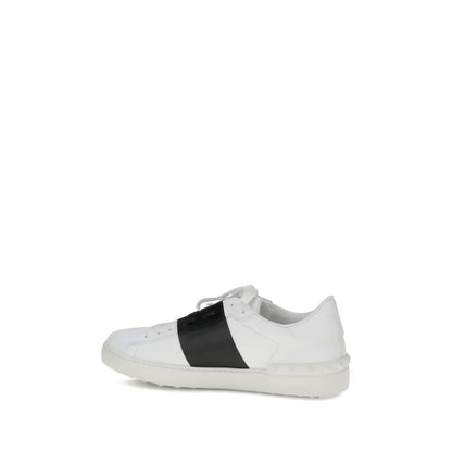 Valentino Garavani White Calf Leather Bos Taurus Low Top Sneakers with contrasting side bands and studs on heel.