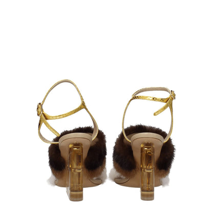 Fendi Brown Mink Strap-On Sandals with high heels, buckle closure, and gold accents, featuring open toe and vintage effect