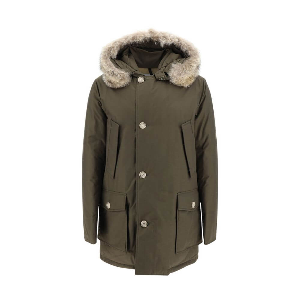 Woolrich Green Cotton Parka with fur hood, front zip closure, side patch pockets, and padded design for AW25 season.