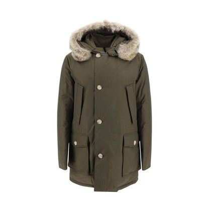 Woolrich Green Cotton Parka with fur hood, front zip closure, side patch pockets, and padded design for AW25 season.