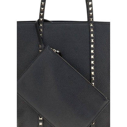 Valentino Garavani Black Calf Leather Bos Taurus Shoulder Bag with iconic platinum-finish studs and removable pouch.