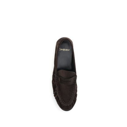 Saint Laurent Brown Calf Leather Bos Taurus Slip-On Loafers with gold Cassandre detail and hand-stitched moc toe, top view.