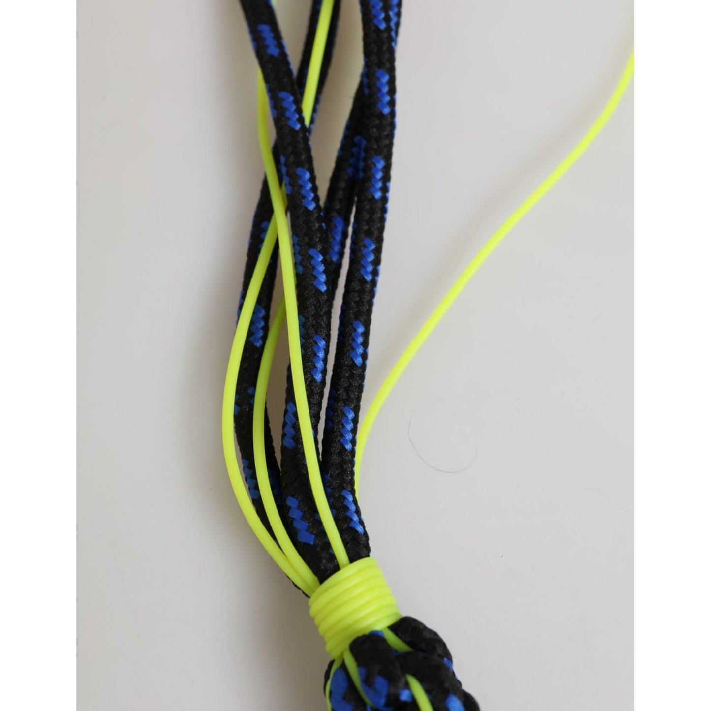 Close-up of Dolce & Gabbana Multicolor Polyester Tape String DG Logo Keychain Keyring, featuring vibrant blue and yellow strings.