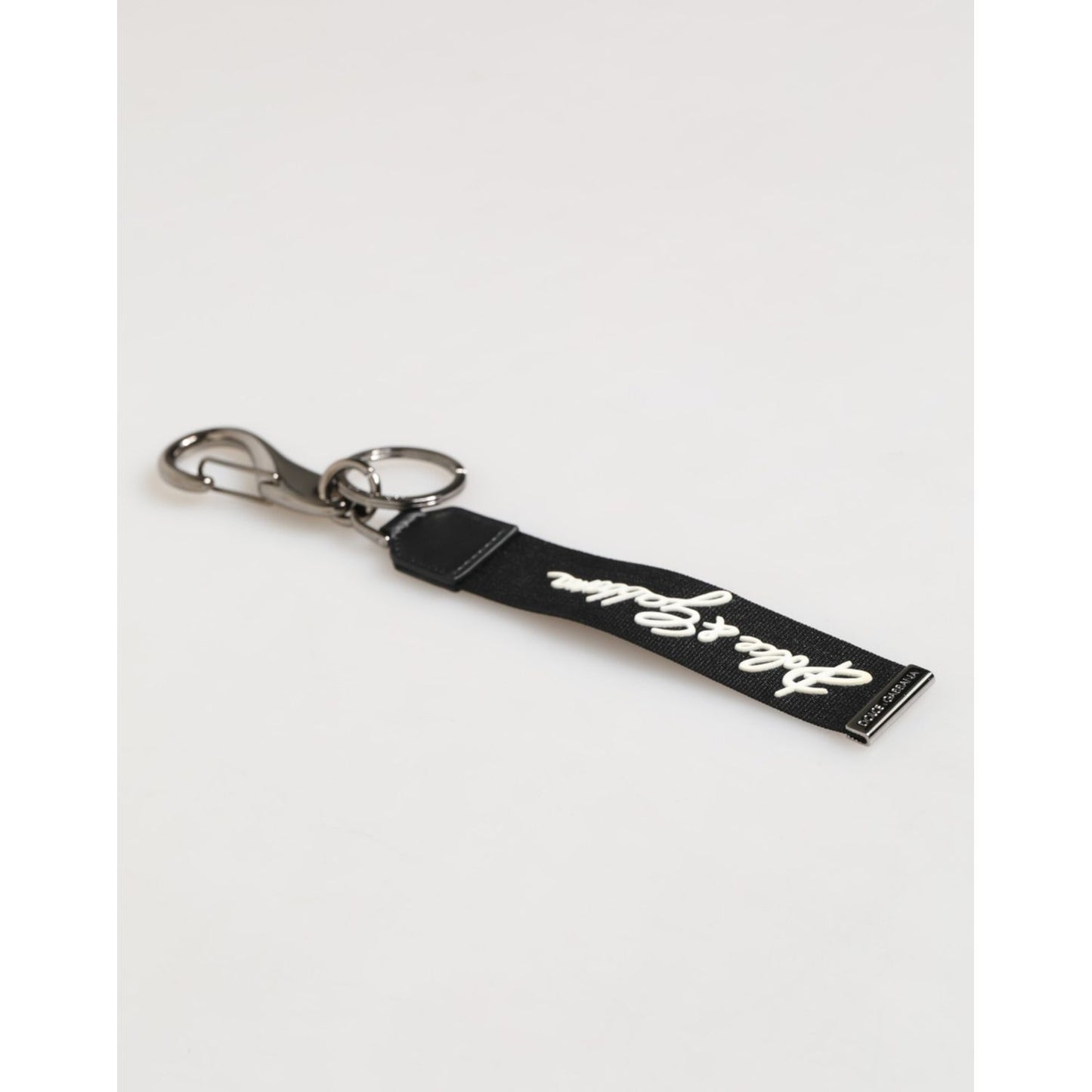 Dolce & Gabbana Black White Polyester DG Logo Silver Men Keychain Keyring with metal hardware and black strap.