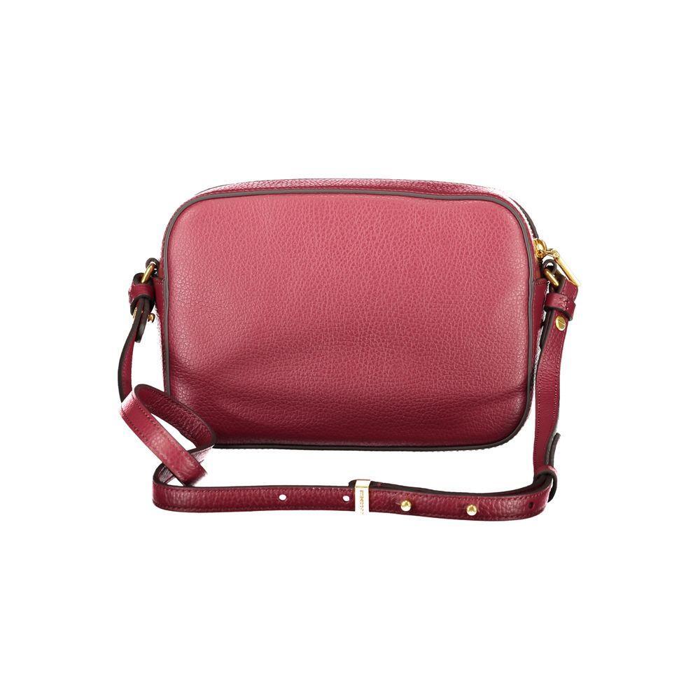 Front view with bag zipped and handles upright.