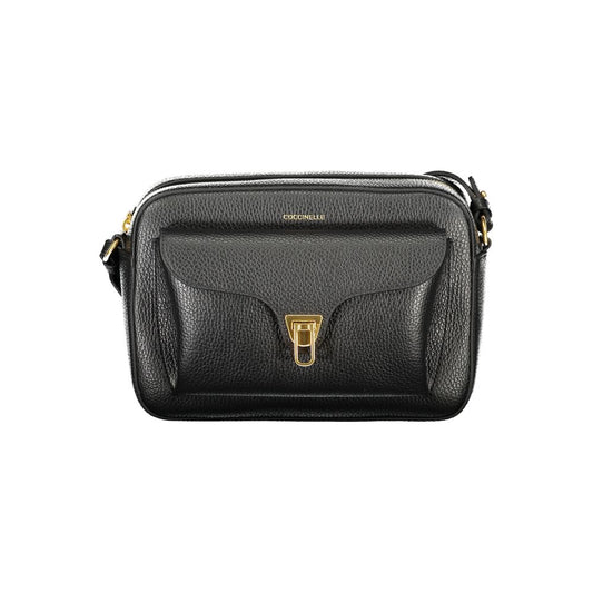 Coccinelle Black Leather Women Handbag with adjustable shoulder strap and twist closure pocket, showcasing Italian craftsmanship and elegance.