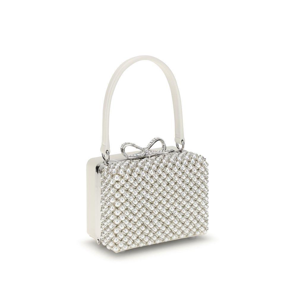 Front view with bag zipped and handles upright.