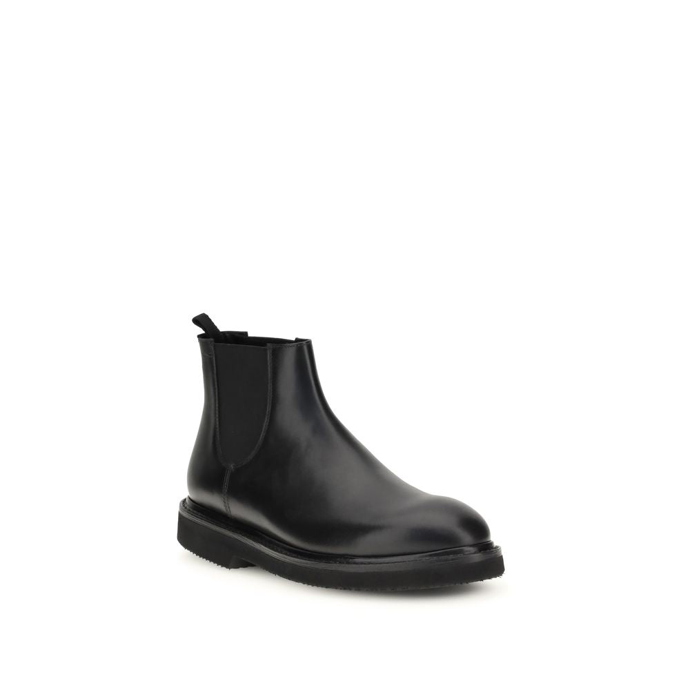 Premiata Chelsea Ankle Boots in dark brown calf leather with durable Goodyear construction and platform sole, made in Italy.