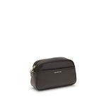 Michael Kors Jet Set Bag with adjustable strap and gold-tone details. Elegant design, secure zip, and functional open front pocket.