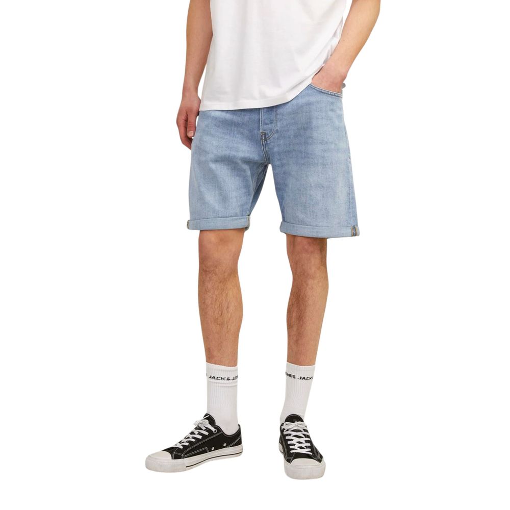Jack Jones Light Blue Cotton Bermuda Shorts with rolled-up hem, modeled for casual style.