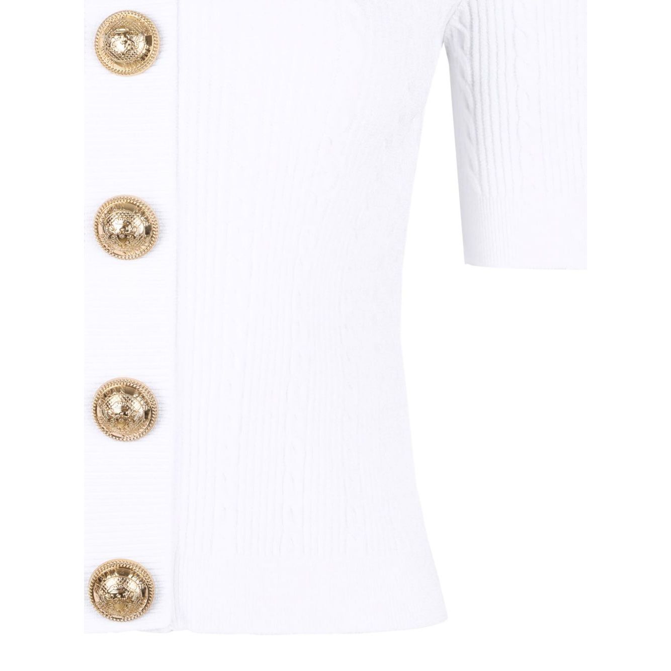 Close-up of white Balmain Ribbed buttoned top with gold buttons, short sleeves, and crewneck design.