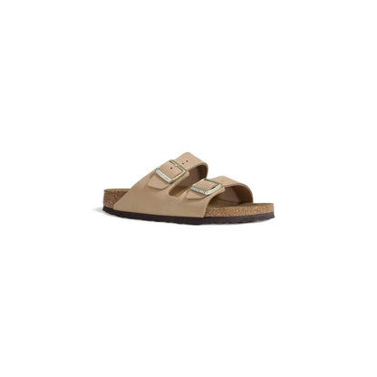 Birkenstock Beige Nubuc Leather Sandal with cork footbed and adjustable straps for women’s comfort and style.