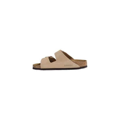 Birkenstock Beige Nubuc Leather Sandal with adjustable straps and cork footbed, ideal for comfort and style.