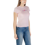 Woman wearing Calvin Klein Jeans Multicolor Recycled Cotton T-Shirt in pink with logo, ideal for summer