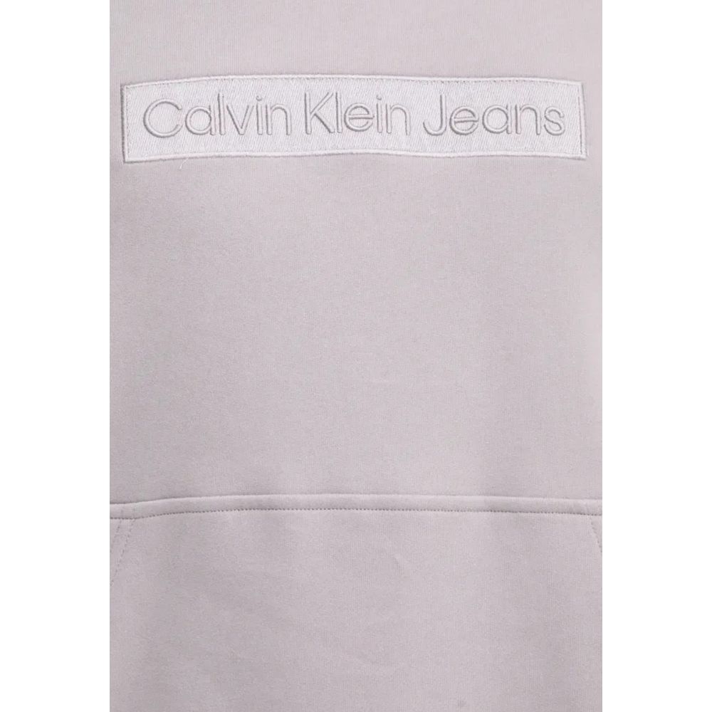 Calvin Klein Jeans Purple Cotton Hoody with embroidered logo, perfect for casual wear and comfort.
