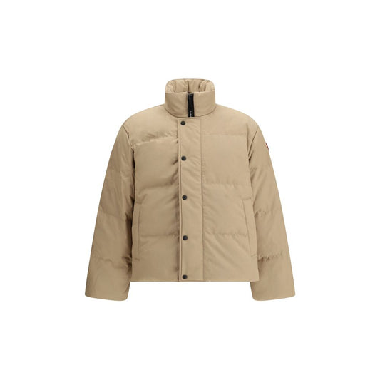 Canada Goose Parka Bayview in beige, water-repellent fabric with zip and button closure, adjustable hem, AW25 oversized fit, front view.