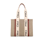 Chloé Chloe Woody Medium Tote Bag in linen with leather detail, featuring double shoulder straps and spacious compartment.