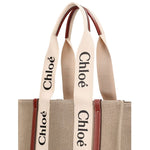 Chloé Chloe Woody Medium Tote Bag with logo straps, 100% linen, leather details, 37cm length, 26cm height, made in Italy.