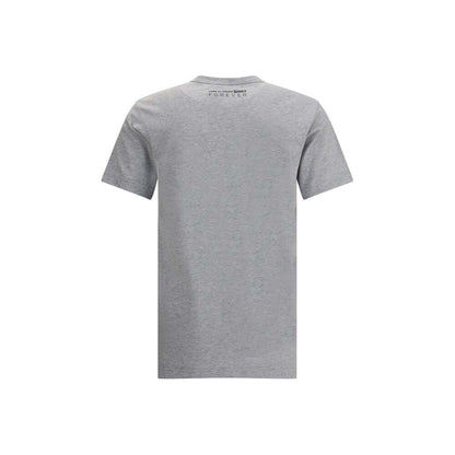 Rear view of Comme Des Garçons Gray Cotton T-Shirt with printed logo, minimalist design, crew neck, and short sleeves, 100% cotton.
