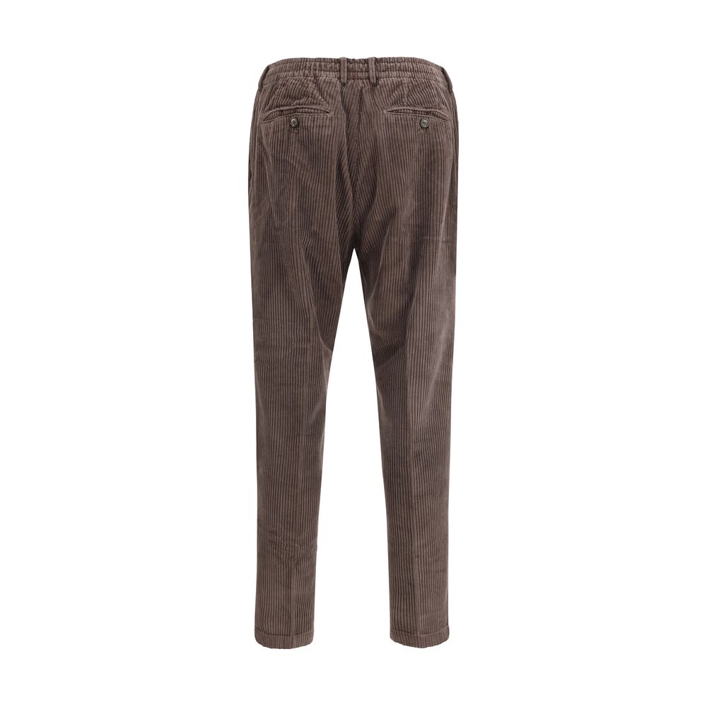 Back view of Cruna Brown Cotton Casual Pants, featuring slim fit and corduroy fabric for a refined autumn-winter look.