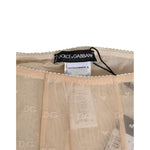 Dolce & Gabbana Beige Nylon Stretch Logo Lace Leggings Underwear showing fabric and label details.