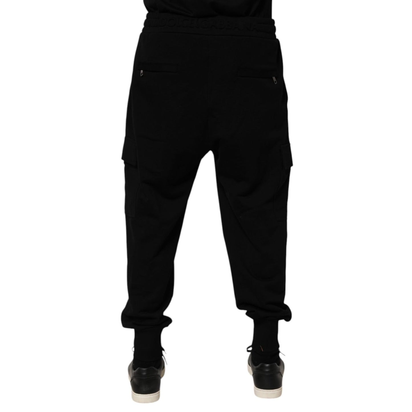 Back view of Dolce & Gabbana Black Cotton Blend Cargo Joggers Drawstring Pants with cuffed hems and cargo pockets.