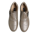 Dolce & Gabbana Brown Leather Men Low Top Sneakers Shoes with minor pen and glue marks, luxury Italian craftsmanship.