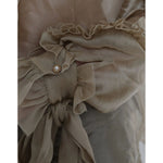 Close-up of Dolce & Gabbana Gold Ascot Collar Ruffles Blouse Top showcasing ruffles and button detail.