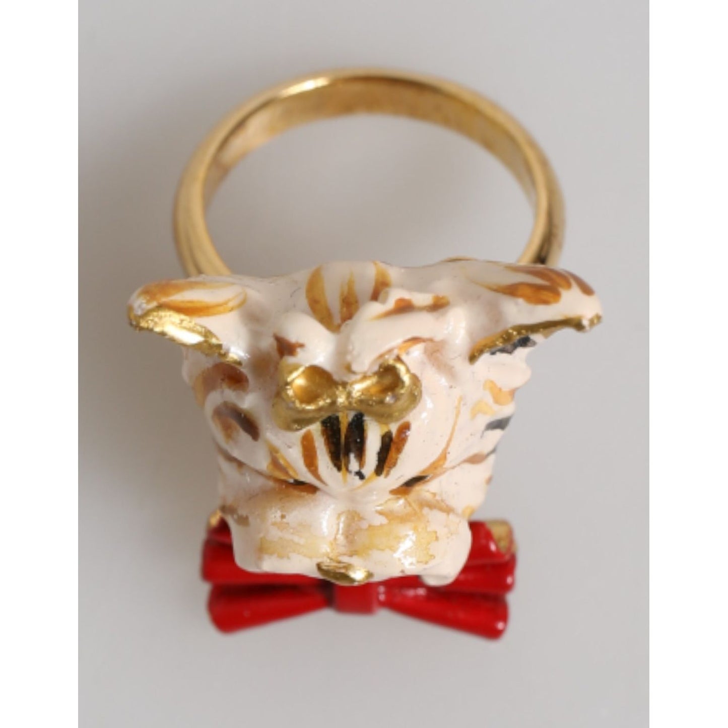 Dolce & Gabbana Gold Brass Resin Beige Dog Pet Accessory Ring with red bow detail.