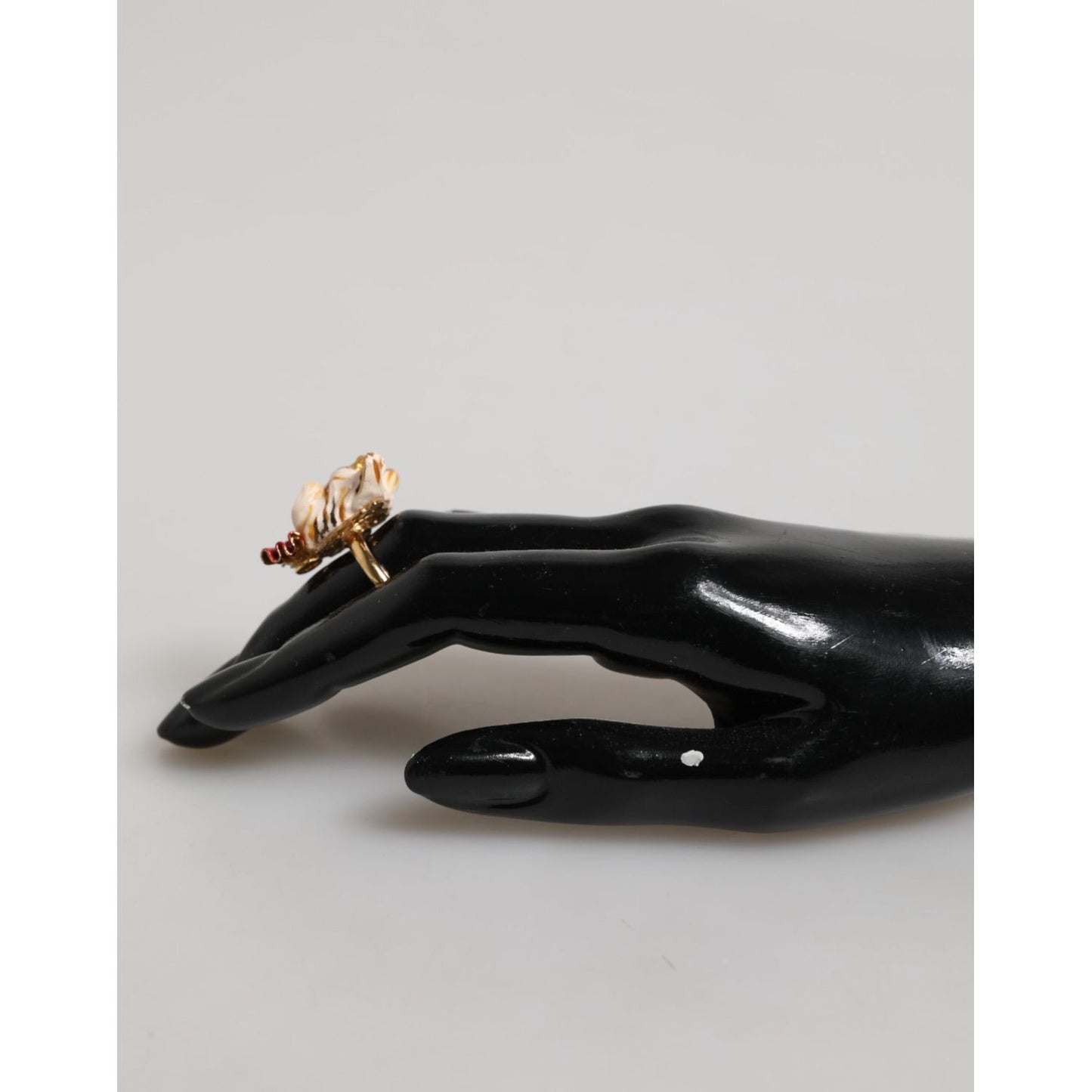 Dolce & Gabbana Gold Brass Resin Beige Dog Pet Accessory Ring displayed on black mannequin hand.