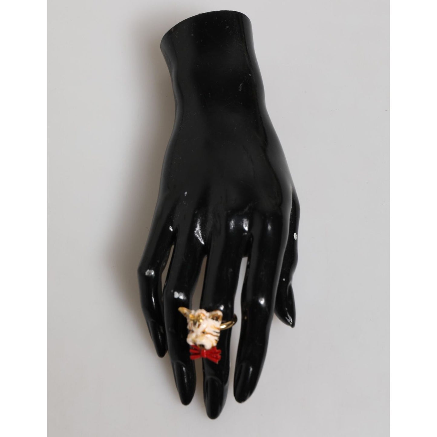 Dolce & Gabbana Gold Brass Resin Beige Dog Pet Accessory Ring on display with black mannequin hand.