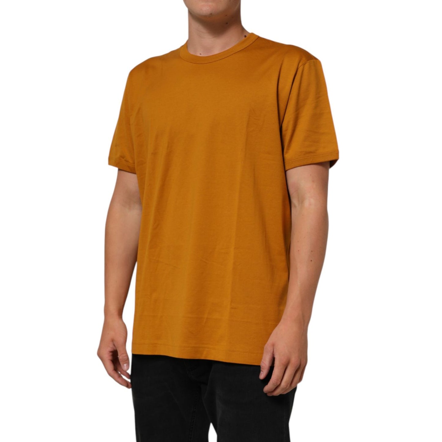 Dolce & Gabbana Golden Brown Crew Neck Short Sleeve T-shirt on man, crafted from 100% cotton, showcasing Italian style and comfort.