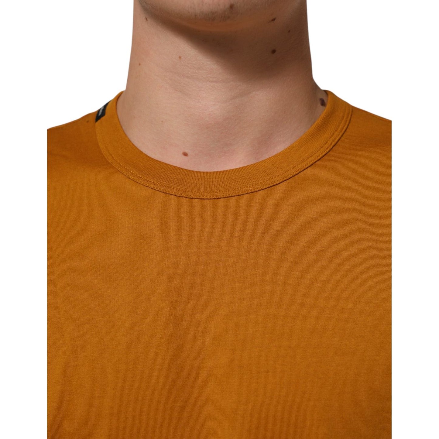 Dolce & Gabbana Golden Brown Crew Neck Short Sleeve T-shirt in premium cotton, showcasing Italian craftsmanship and classic design.