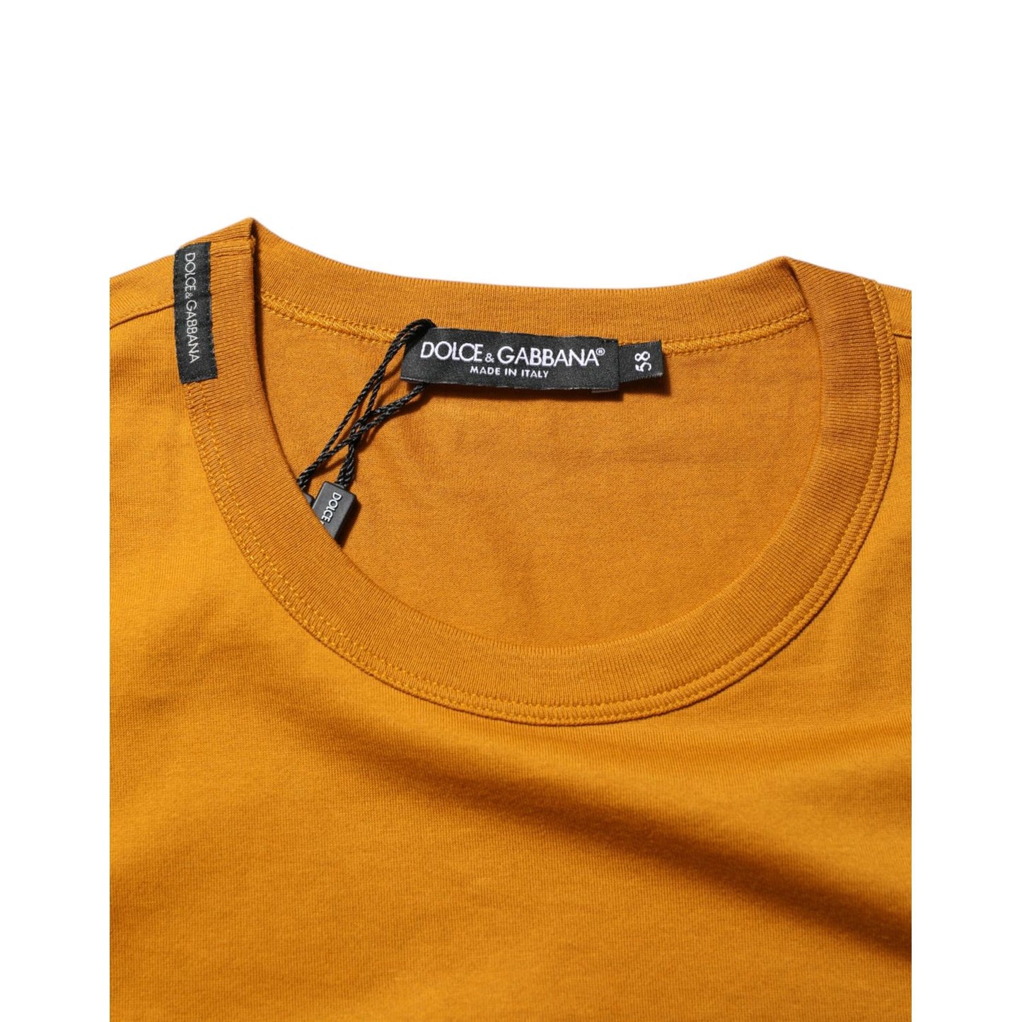 Dolce & Gabbana Golden Brown Crew Neck Short Sleeve T-shirt showcasing label and craftsmanship detail.