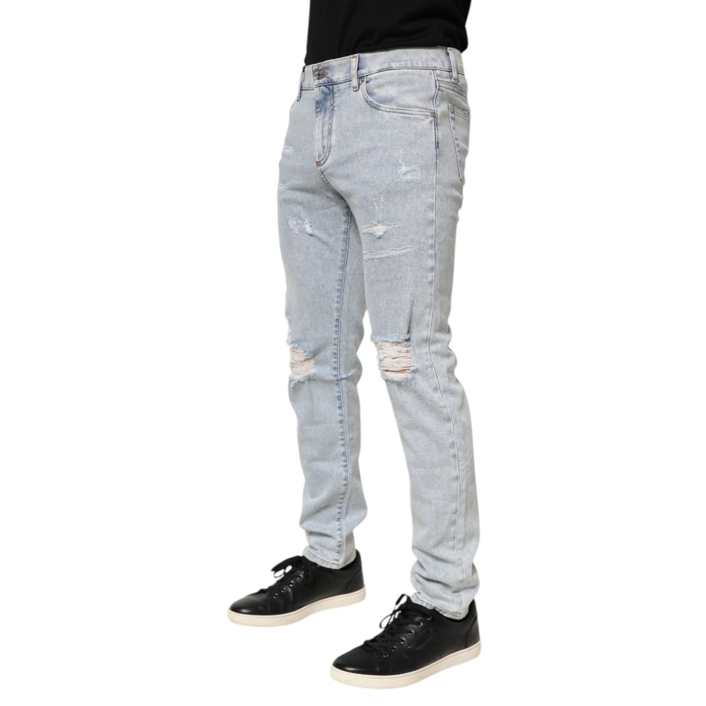 Dolce & Gabbana Light Blue Distressed Slim Fit Ripped Denim Jeans for men, featuring a trendy design and premium Italian denim.