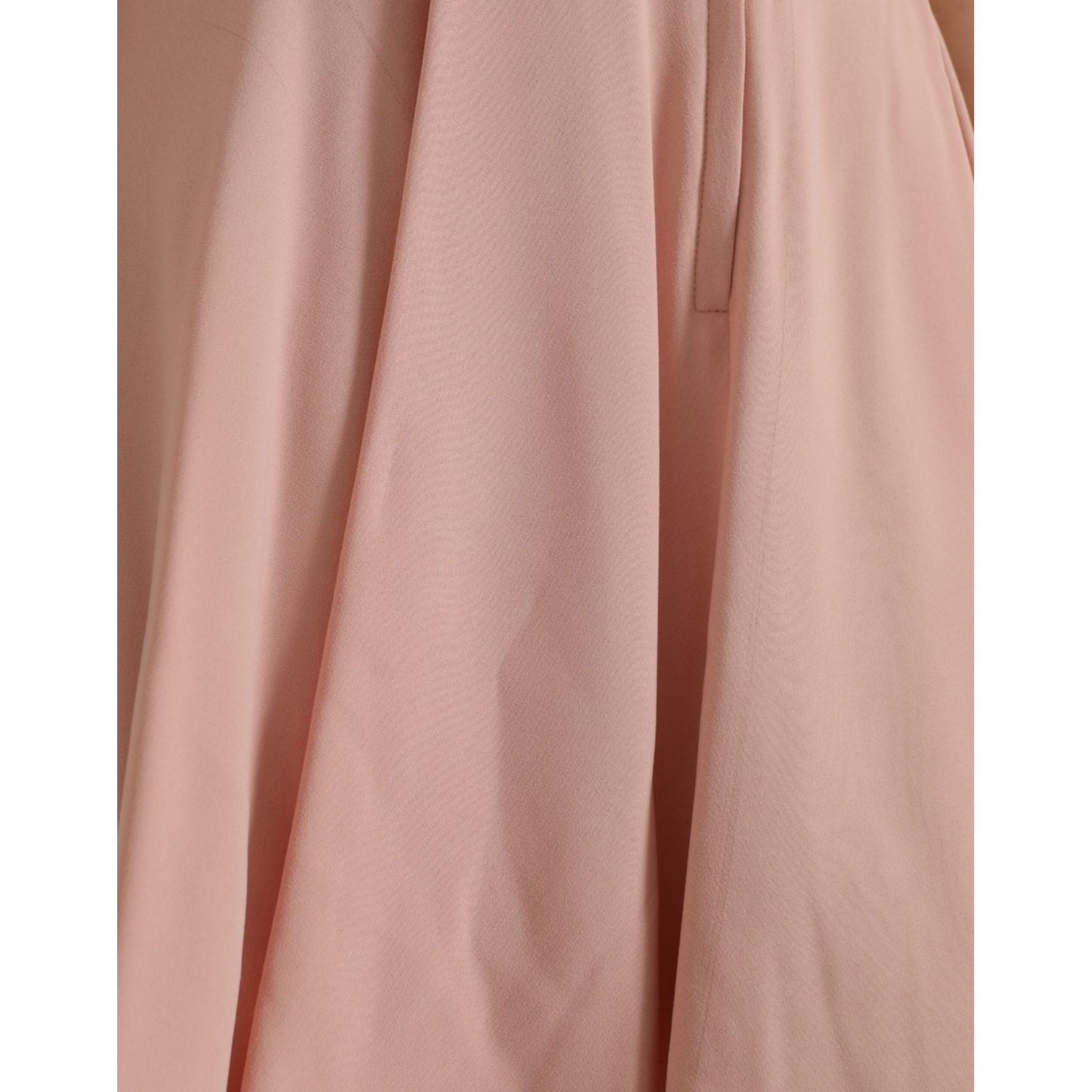 Close-up of Dolce & Gabbana Light Powder Rose Viscose Pleated Skirt in luxurious fabric.