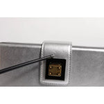 Close-up of Dolce & Gabbana Metallic Silver DG BOX Leather Shoulder Strap Bag showcasing metallic finish and detailing.