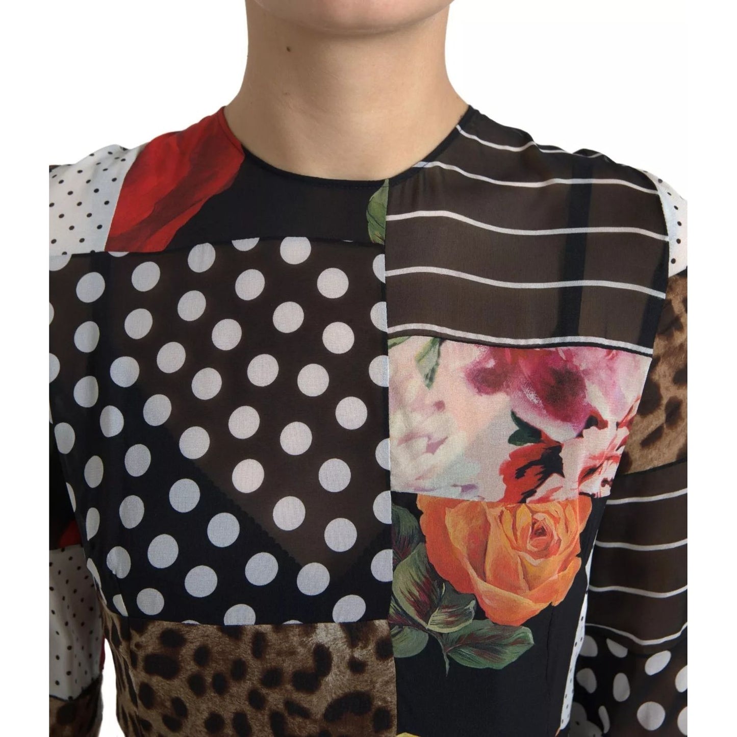 Close-up of Dolce & Gabbana Multicolor Patchwork Floral Leopard Dress showing floral, polka dot, and leopard print patterns.