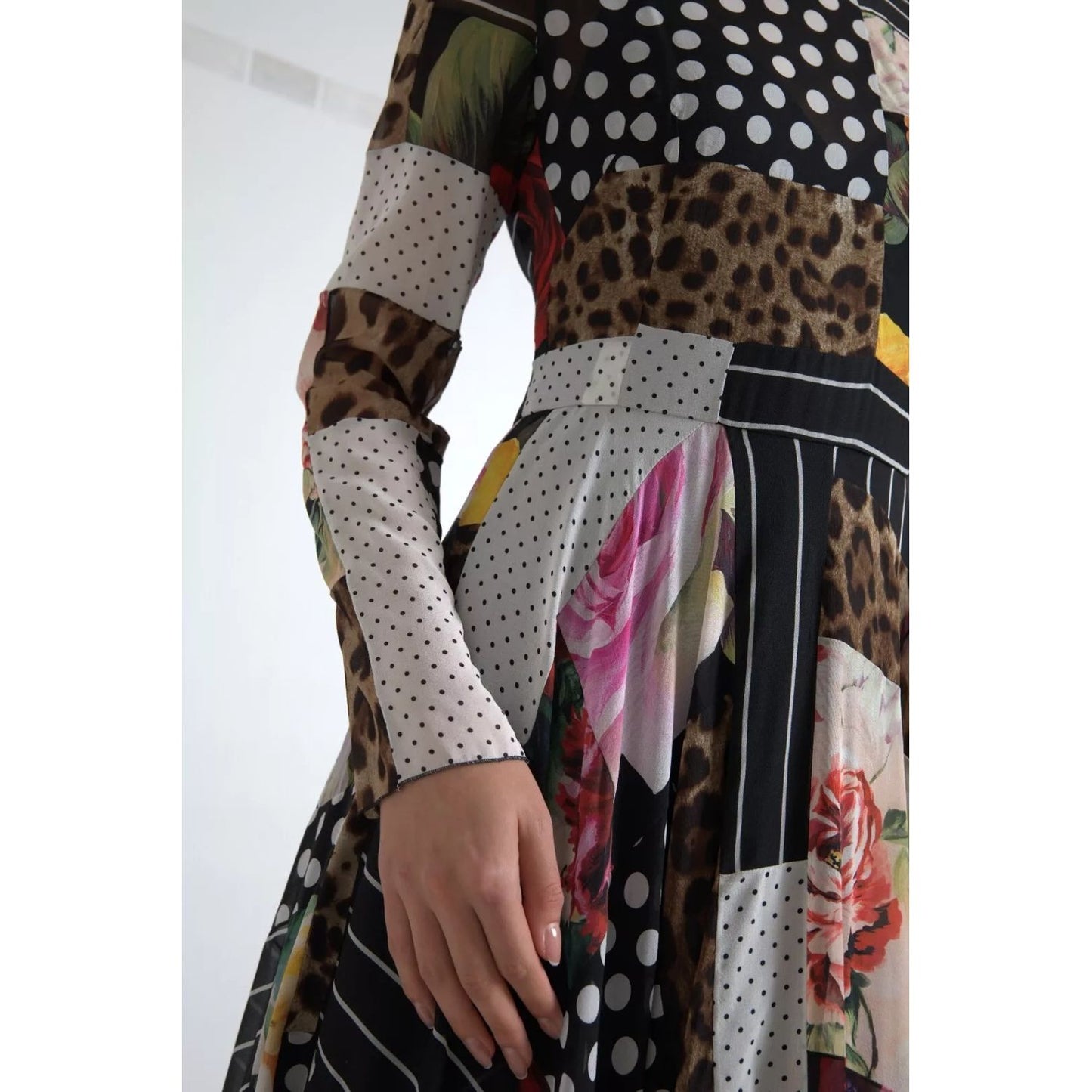 Close-up of Dolce & Gabbana Multicolor Patchwork Floral Leopard Dress showcasing silk and elastane fabric with floral and leopard patterns.