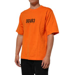 Dolce & Gabbana Orange DGVIB3 Crew Neck Short Sleeves T-shirt, bold modern design, worn by a model, comfortable and stylish fit.