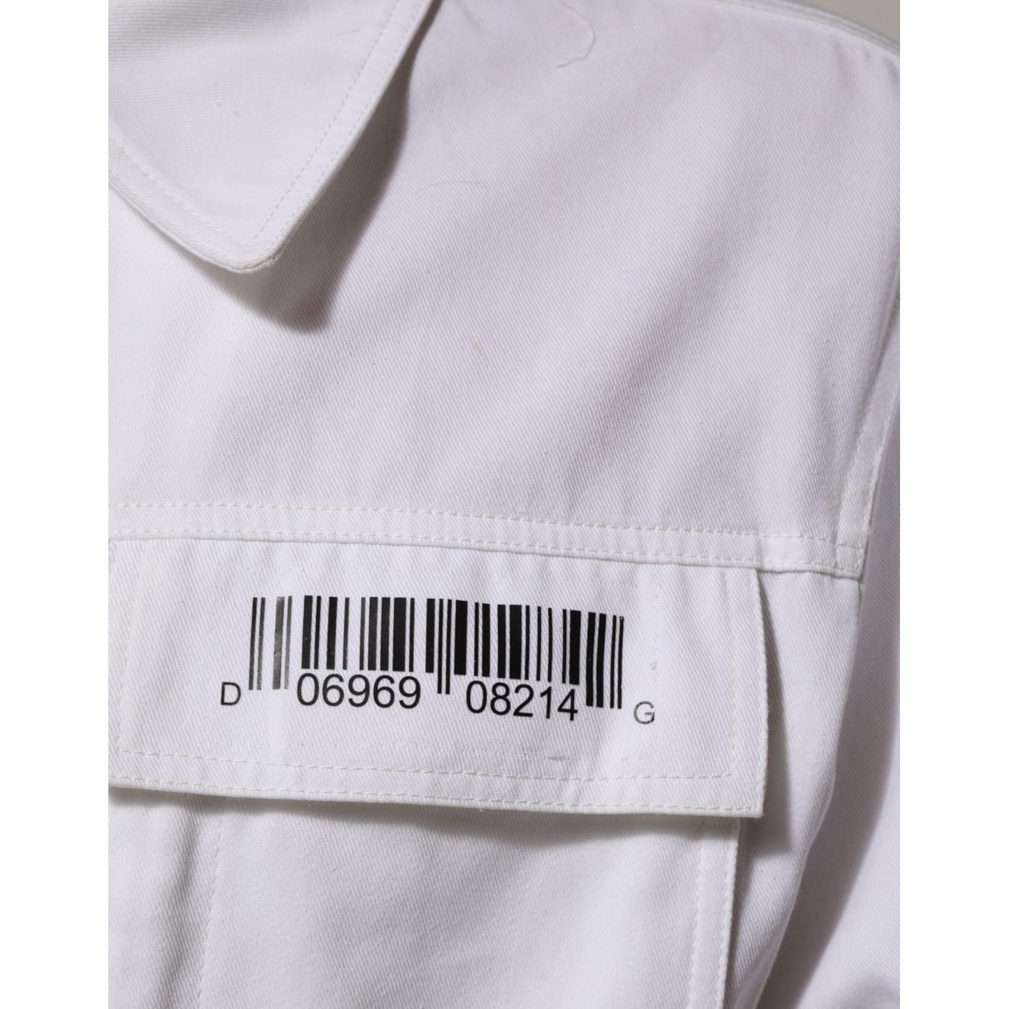 Dolce & Gabbana White Barcode Patch Utility Zip Jumpsuit Pants close-up showing chest barcode detail.