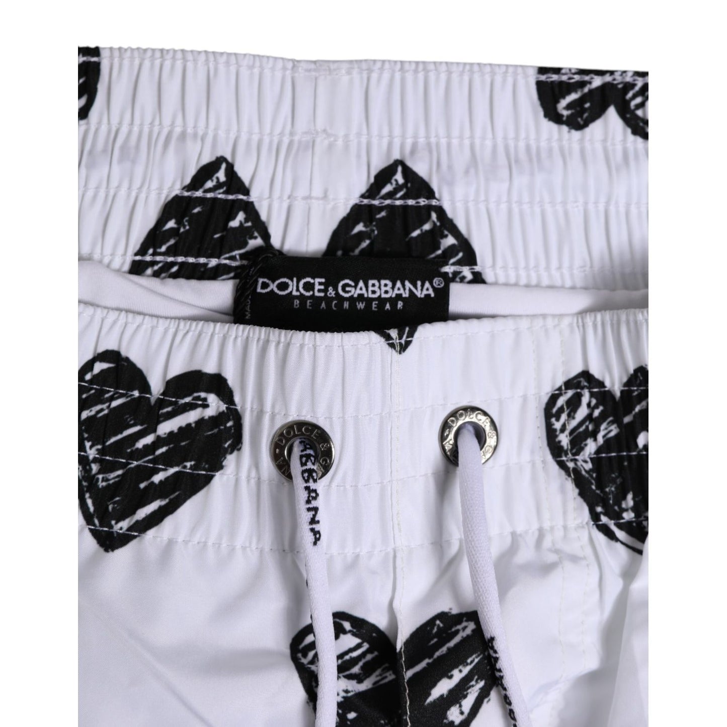 Dolce & Gabbana White Black Heart Print Men Boxer Short Swimwear with elastic waistband and drawstring closure, DG logo detail.