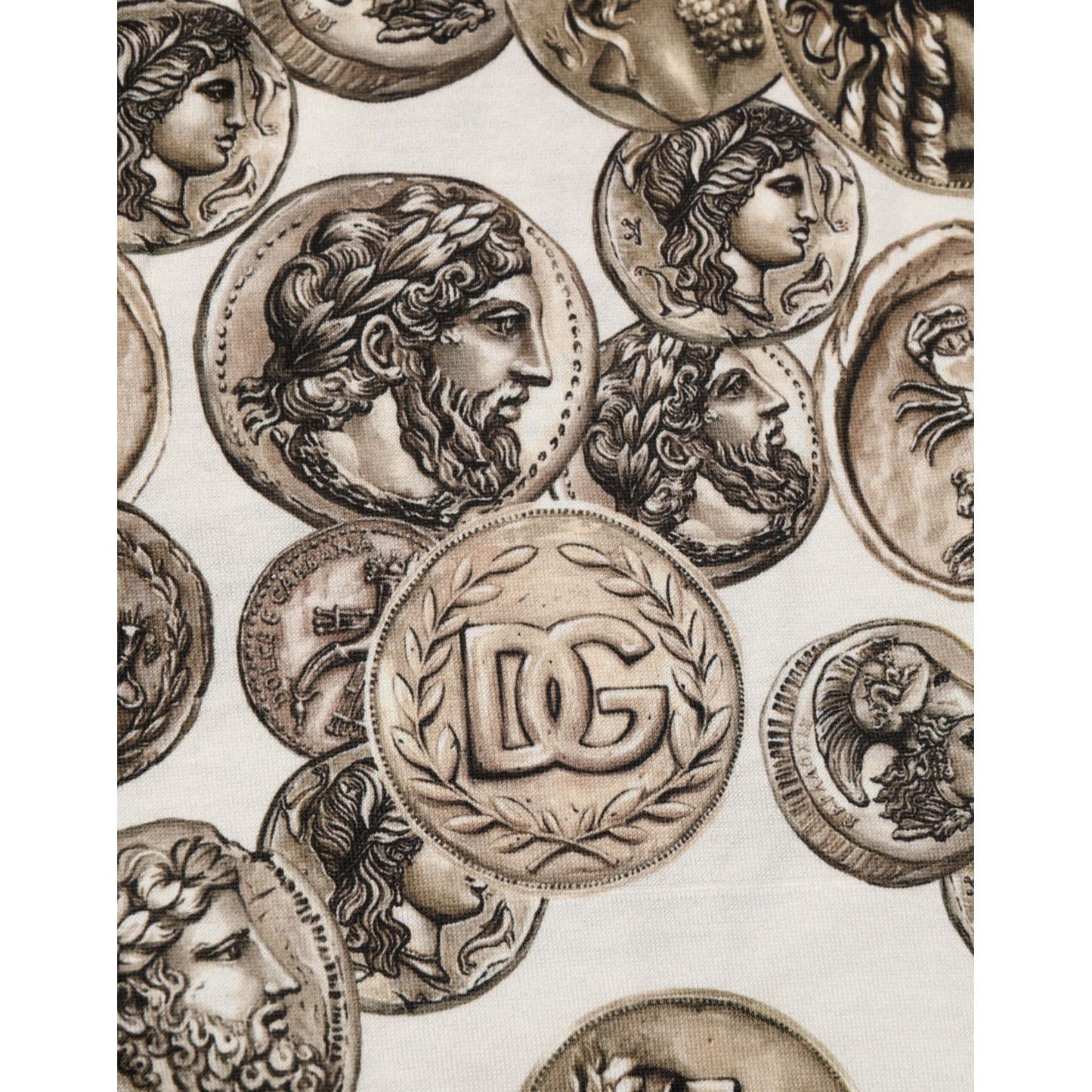 Close-up of Dolce & Gabbana White Coin Print Cotton Crew Neck Men T-shirt featuring intricate coin and D&G logo design detail