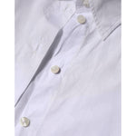 Close-up of Dolce & Gabbana White Collared Short Sleeve Polo Shirt Top, featuring buttons and detailed stitching.