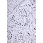 Close-up of Dolce & Gabbana White Cordonetto Lace Beatrice Tote Shopping Bag featuring intricate heart motif in fabric design.