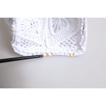 Close-up of Dolce & Gabbana White Cordonetto Lace Beatrice Tote Shopping Bag showing intricate lace details.
