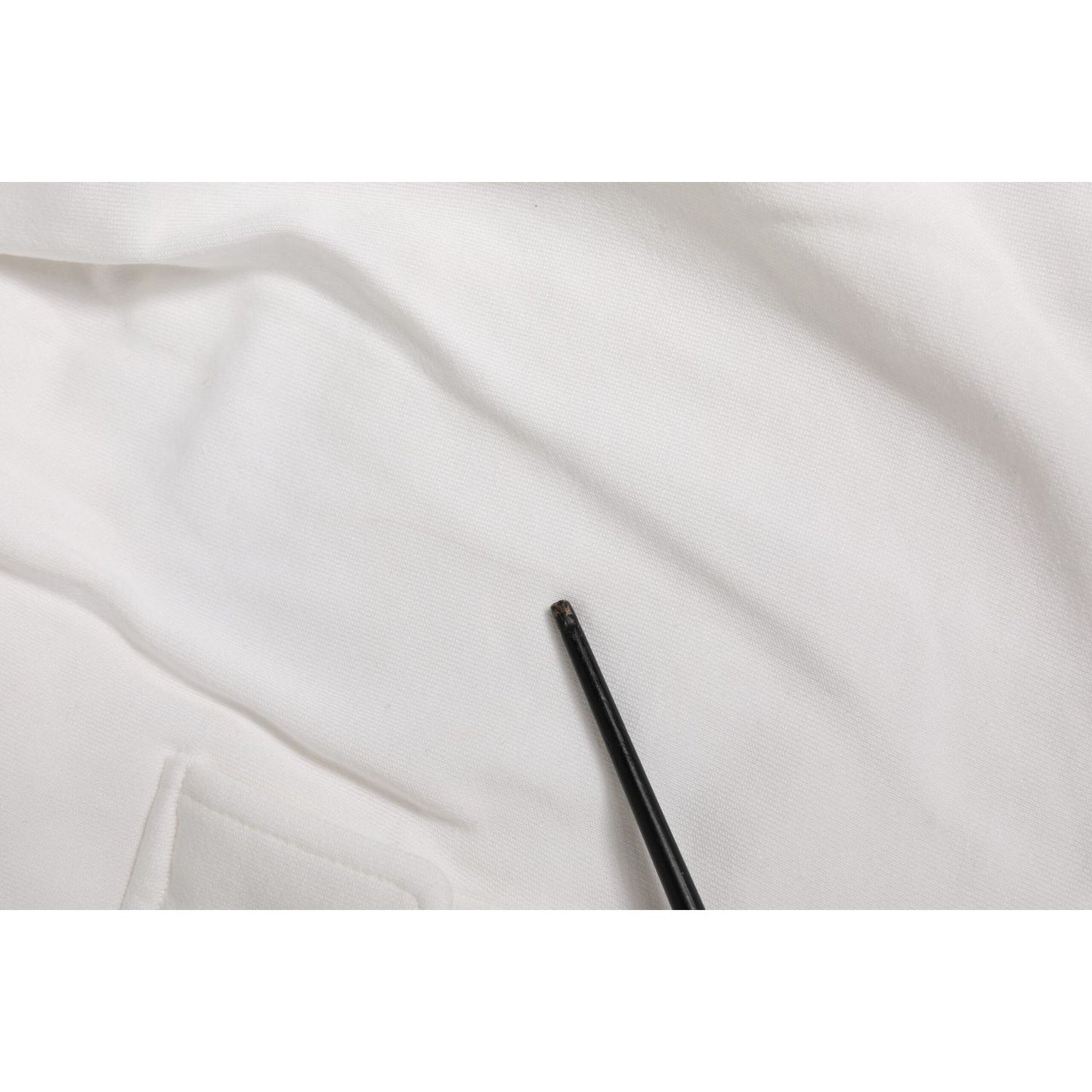 Close-up of Dolce & Gabbana White Cotton Cargo Bermuda Sweatshorts fabric and texture detail, highlighting drawstring and pocket.